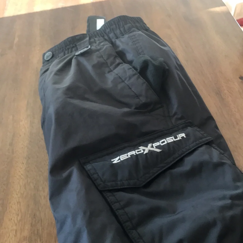Unisex black waist ski pants size M 10-12 ( kids ) length 28-1/2 inch